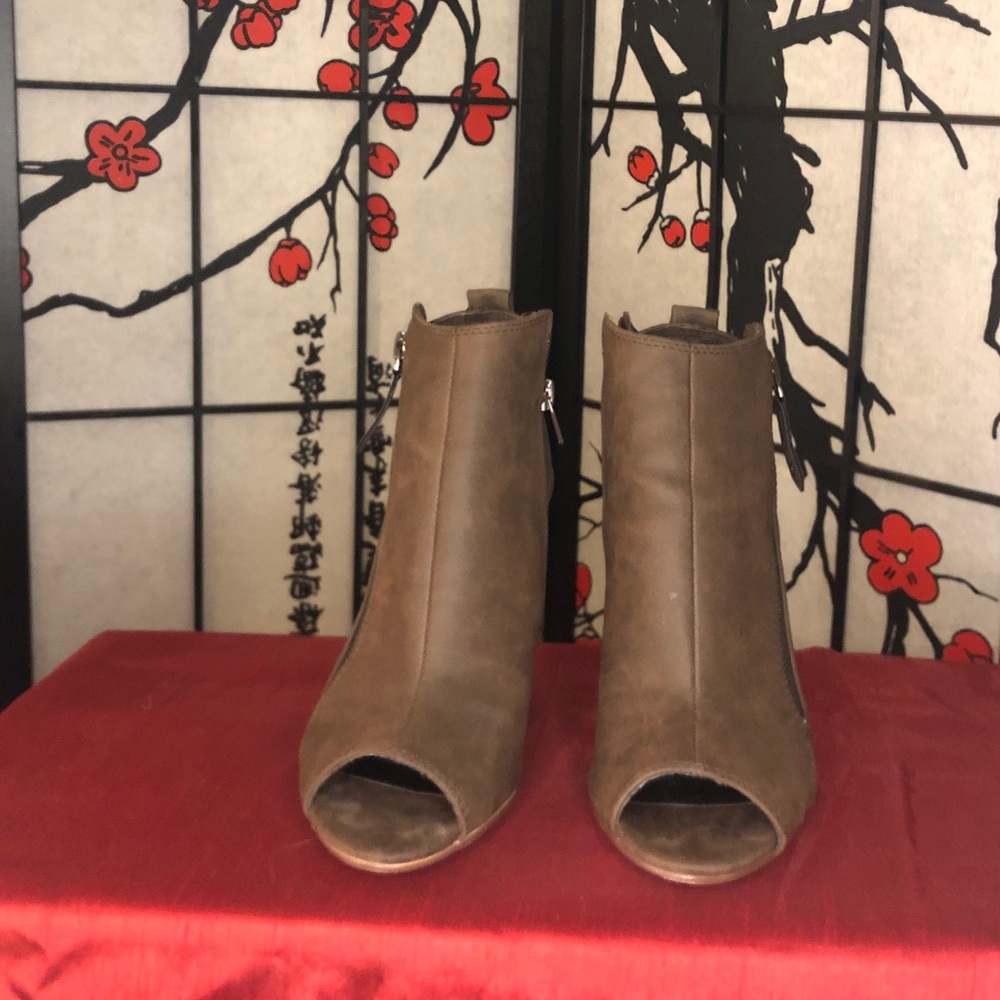 Brown pee toe and heel out booties by indigo